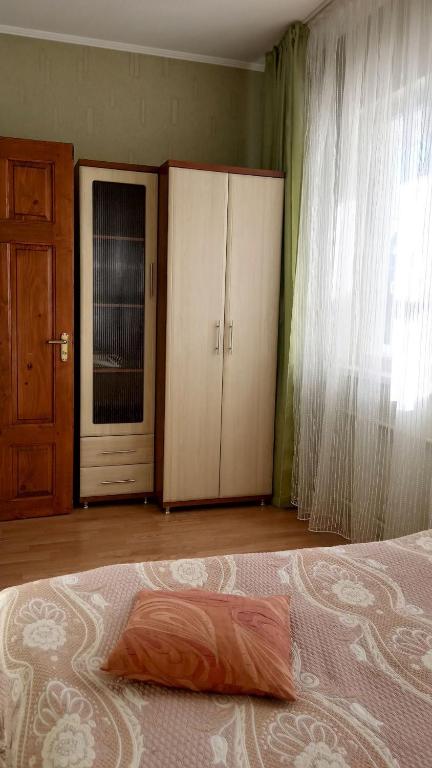 Postel nebo postele na pokoji v ubytování Сонячна