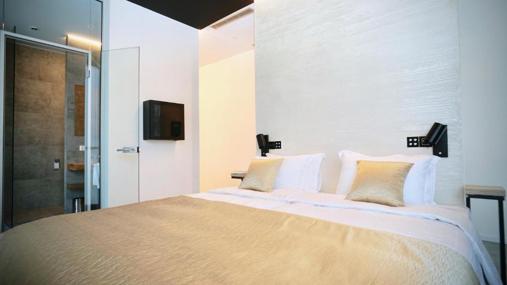 Posteľ alebo postele v izbe v ubytovaní Sky Beach Aparthotel