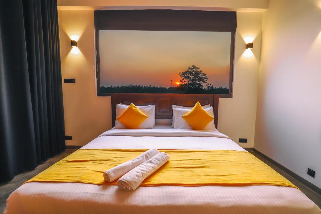 Postel nebo postele na pokoji v ubytování Kalapuwa Resort