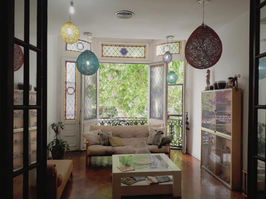 a living room with a couch and a table at Casa Malala in Buenos Aires