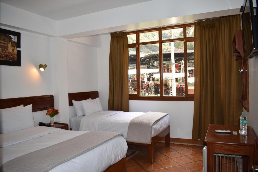 Postel nebo postele na pokoji v ubytování Casa De Luz Hotel