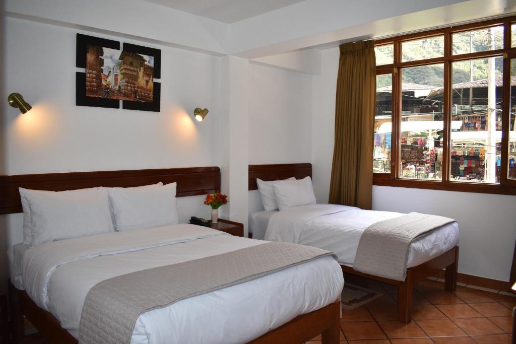 Postel nebo postele na pokoji v ubytování Casa De Luz Hotel