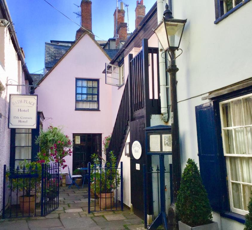 a row of houses in a street at Bath Place Hotel in Oxford
