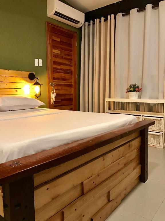 Postel nebo postele na pokoji v ubytování Michel'inn Coron