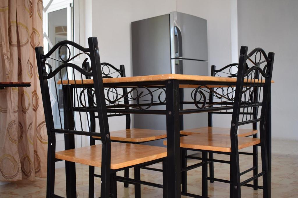 Kuchyň nebo kuchyňský kout v ubytování Oasis Kite Appartment