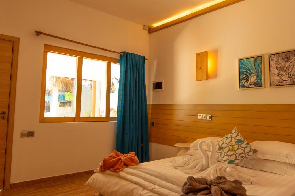 Postel nebo postele na pokoji v ubytování Trip Villa