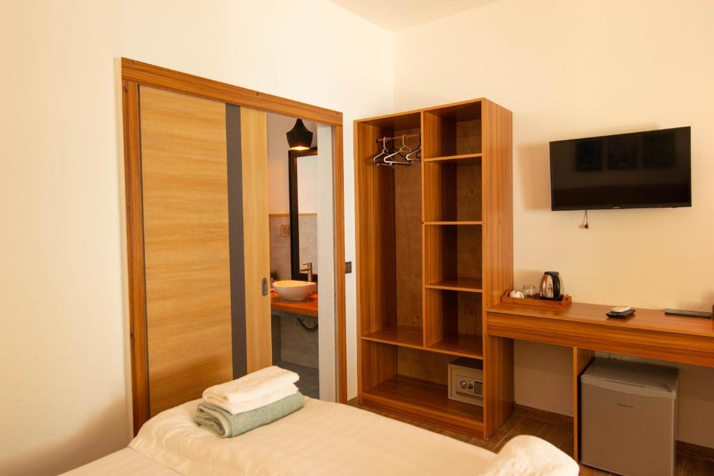 Postel nebo postele na pokoji v ubytování Trip Villa