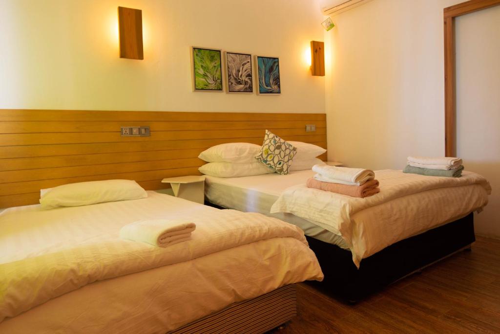 Postel nebo postele na pokoji v ubytování Trip Villa