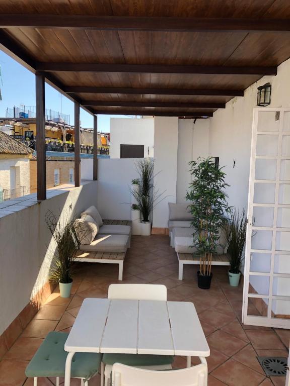 Posezení v ubytování Triana Pelay Suites