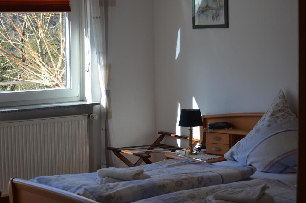 Postel nebo postele na pokoji v ubytování Weingut Sauer-Kettermann