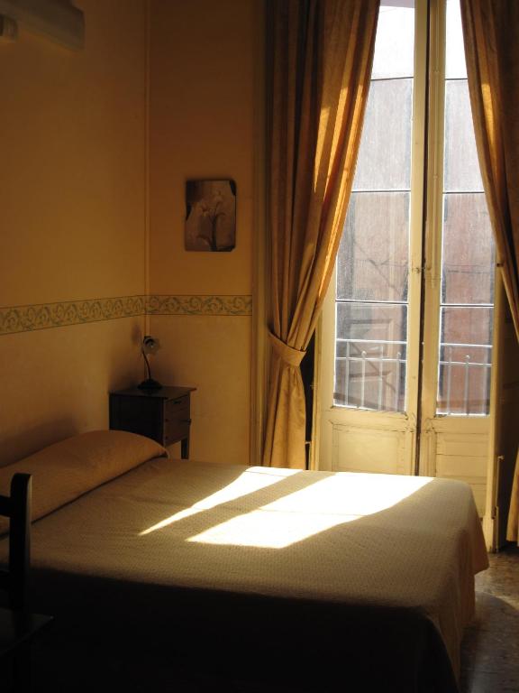 A bed or beds in a room at San Demetrio