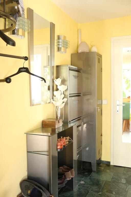 a kitchen with a large stainless steel refrigerator at Dimai House No 31 Dornbirn Messe in Dornbirn
