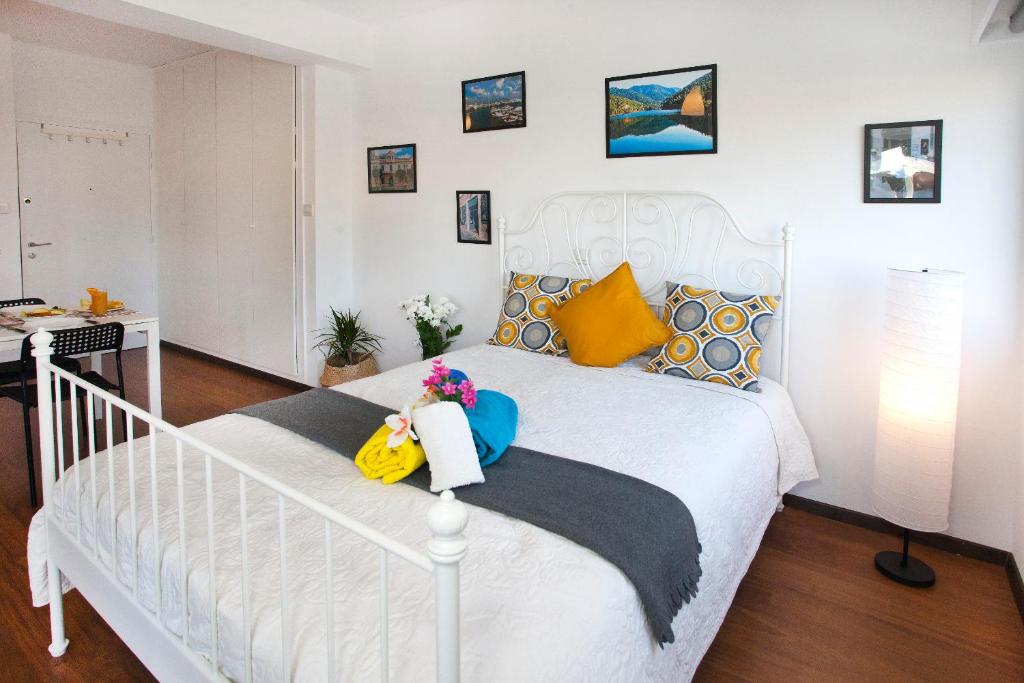 Katil atau katil-katil dalam bilik di Poseidon Boutique Apartment 2