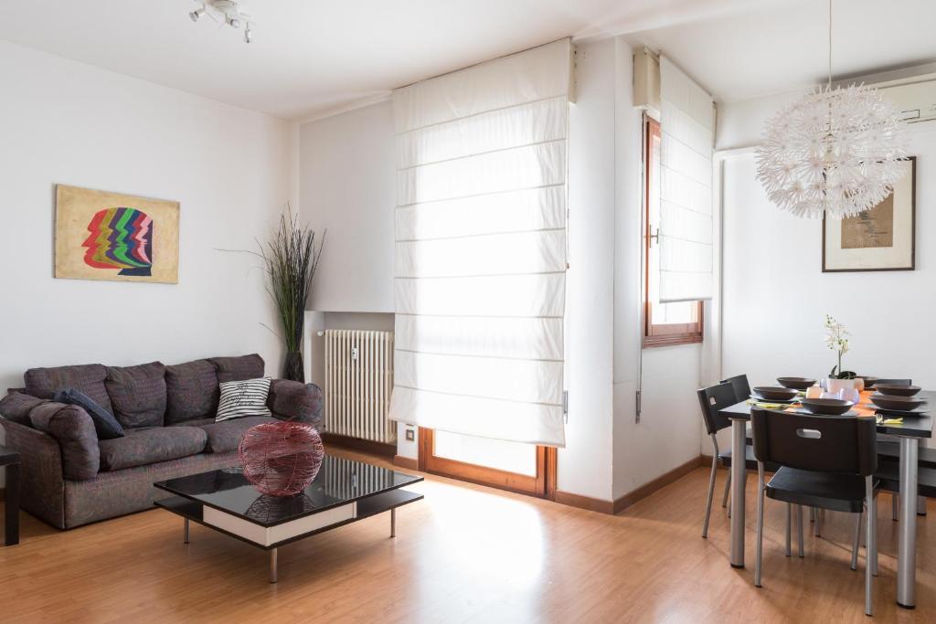 a living room with a couch and a table at Cappuccino 36 House in Venezia in Mestre