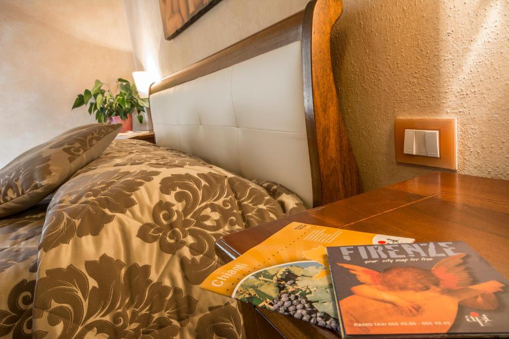 Łóżko lub łóżka w pokoju w obiekcie Antica Pieve B&B