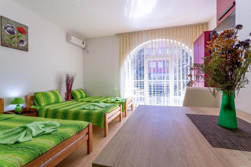 Letto o letti in una camera di Guesthouse Sunny