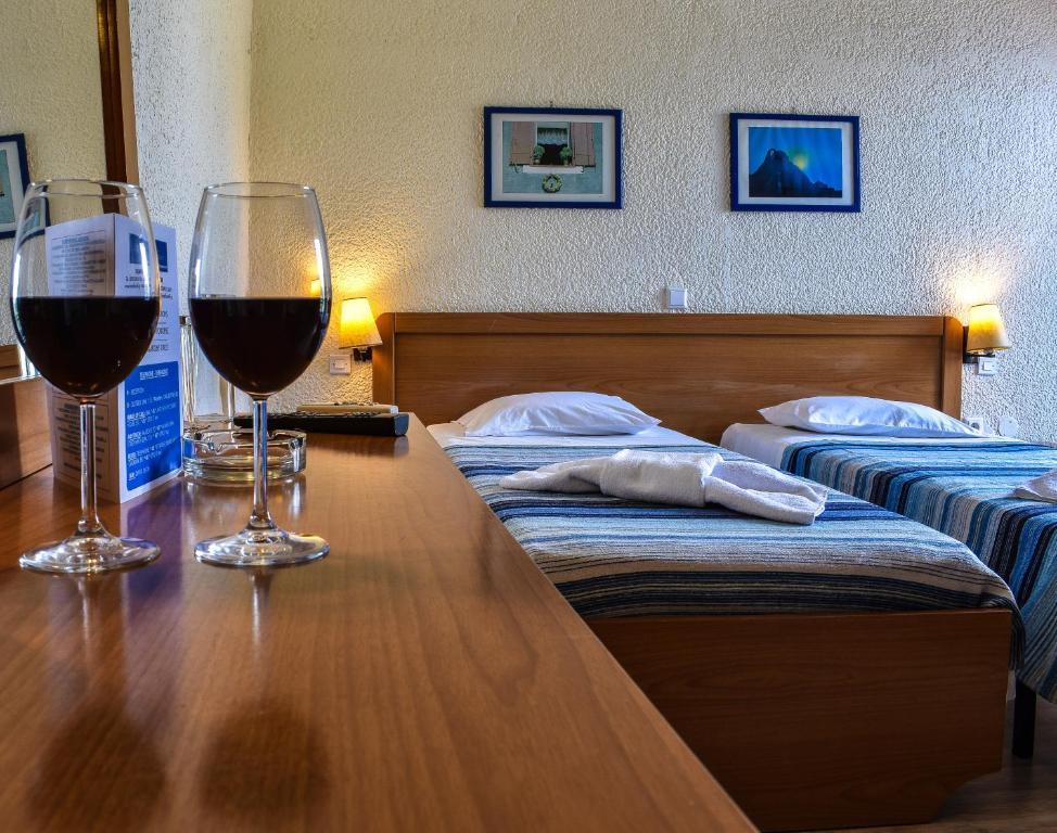 Postel nebo postele na pokoji v ubytování Hotel Kanelli Beach