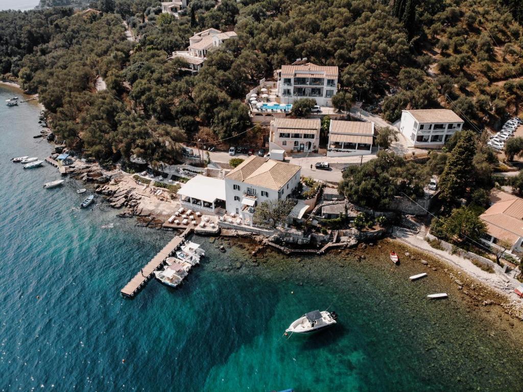 an aerial view of a resort with boats in the water at Elena apt in Kalami