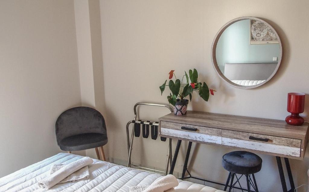 A bed or beds in a room at Sofia City Beach 3 Apts Nea Chora Chania steps from the beach