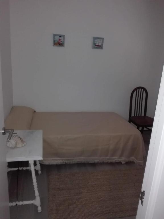 Postel nebo postele na pokoji v ubytování Sa Cala Beach House