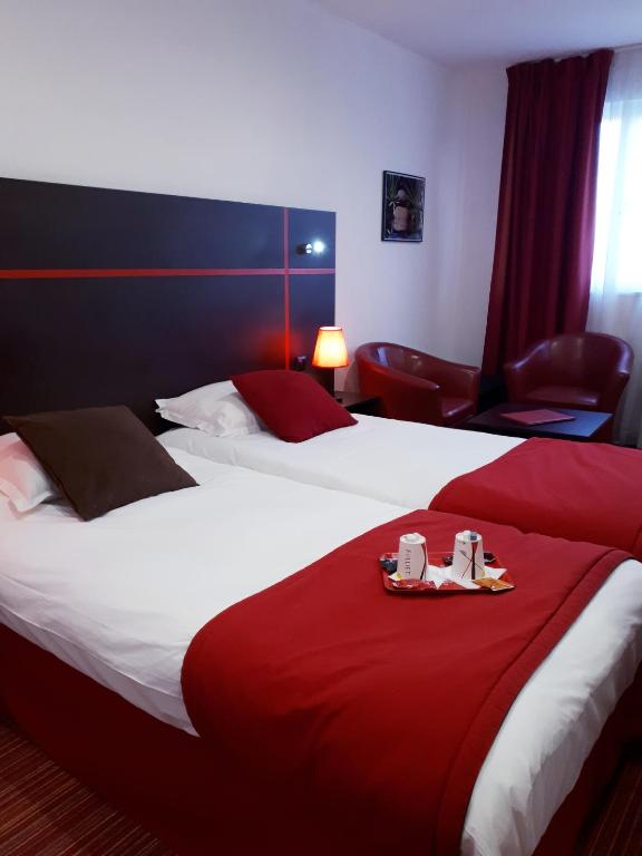 Postel nebo postele na pokoji v ubytování Zenia Hotel & Spa