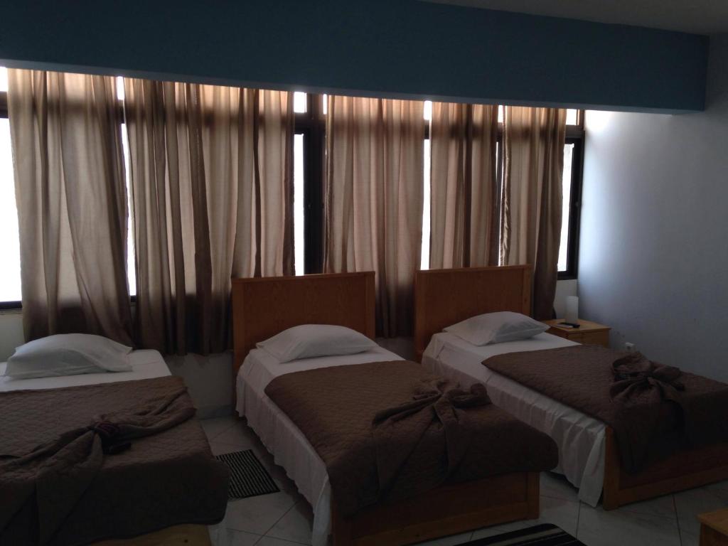 Postel nebo postele na pokoji v ubytování LT Aparthotel