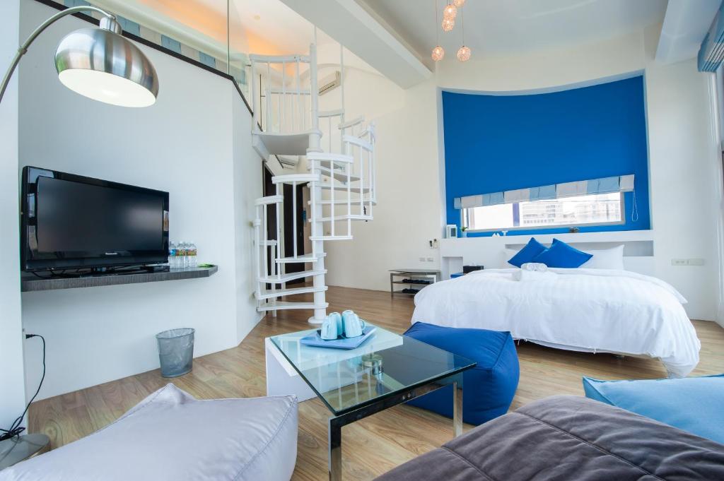 Postel nebo postele na pokoji v ubytování Hai Pu B&B