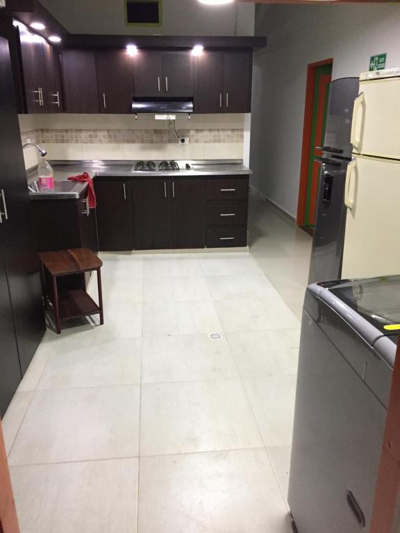 Kuchyň nebo kuchyňský kout v ubytování casa hostal las palmeras