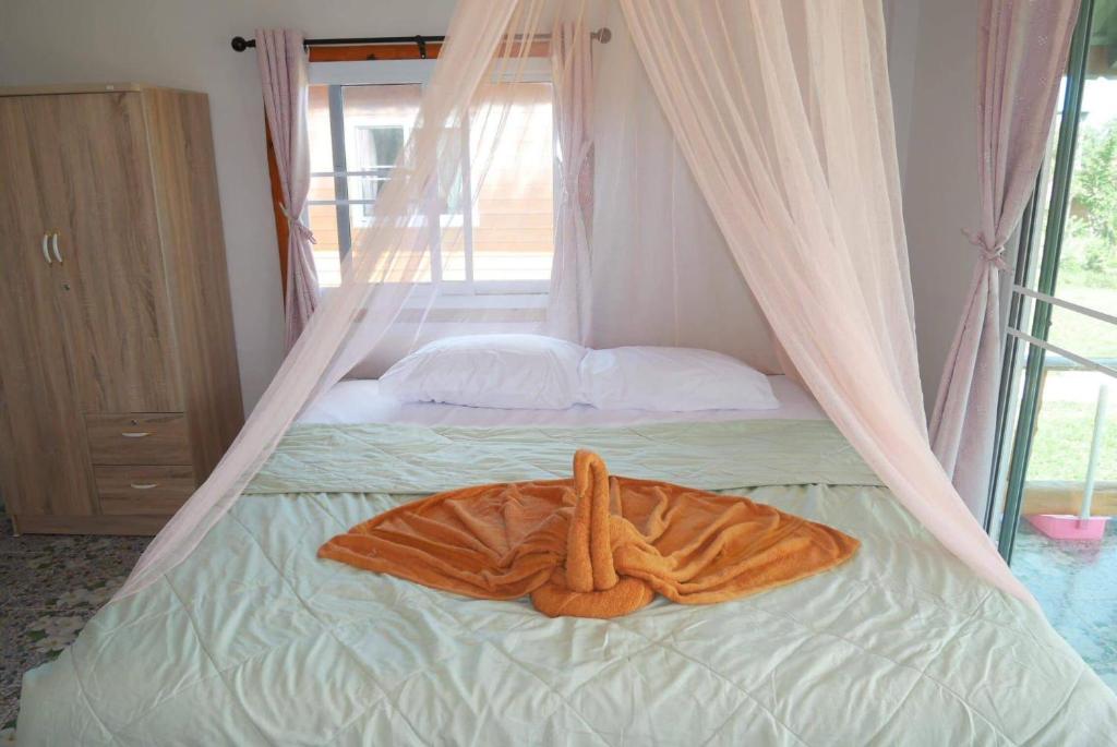 Postel nebo postele na pokoji v ubytování Happy Home Kohjum