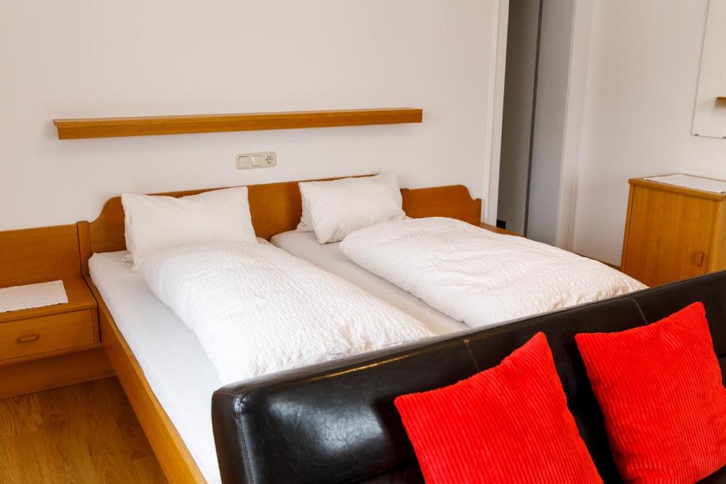 Postel nebo postele na pokoji v ubytování Haus Theresia