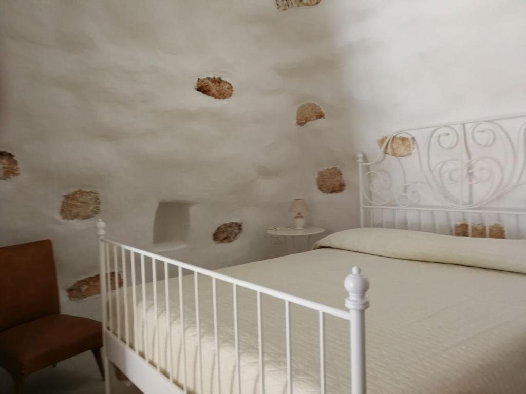 Stella del Sud Guesthouse tesisinde bir odada yatak veya yataklar