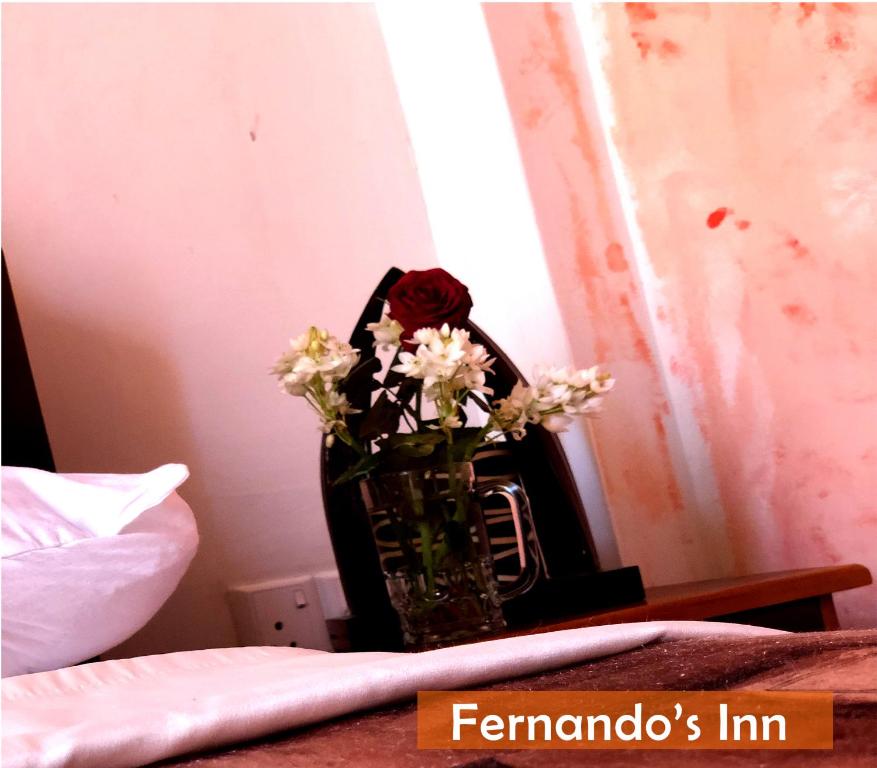 Postel nebo postele na pokoji v ubytování Fernando's Inn