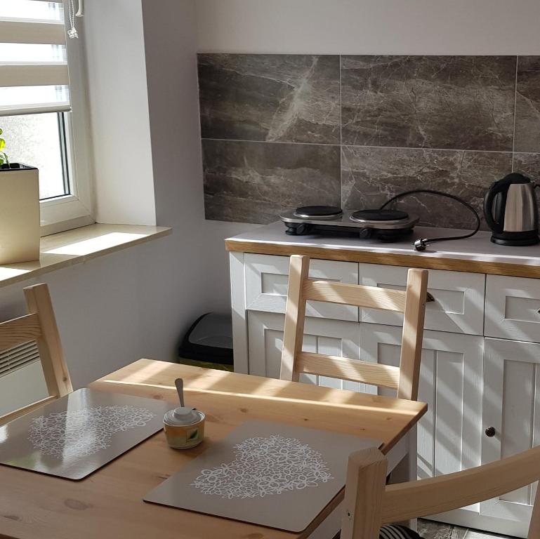 Kuchyňa alebo kuchynka v ubytovaní Apartament Bernadett