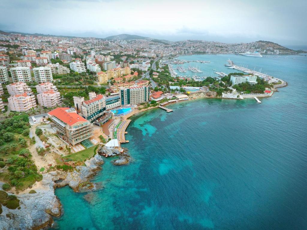 an aerial view of a city and the ocean at Charisma De Luxe Hotel in Kusadası