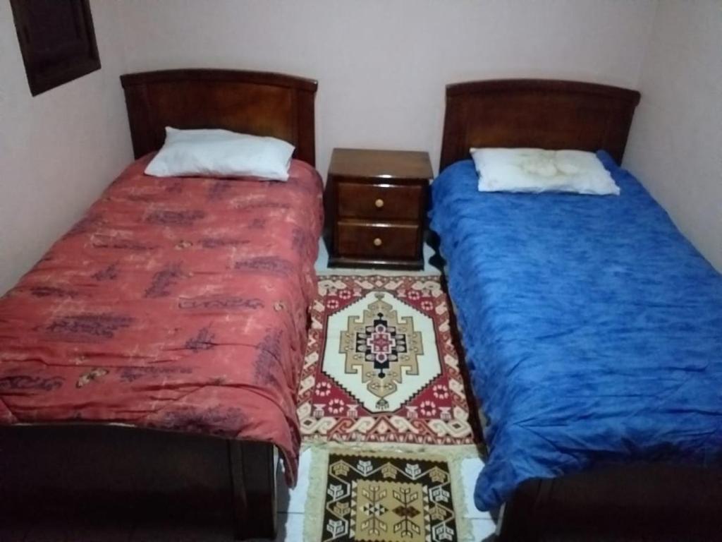 Postel nebo postele na pokoji v ubytování Riad familiale à Marrakech