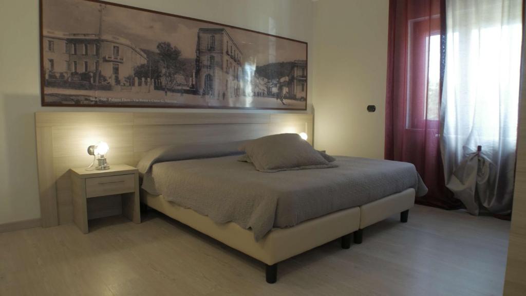 Кровать или кровати в номере Il Borghetto Hotel Ristorante