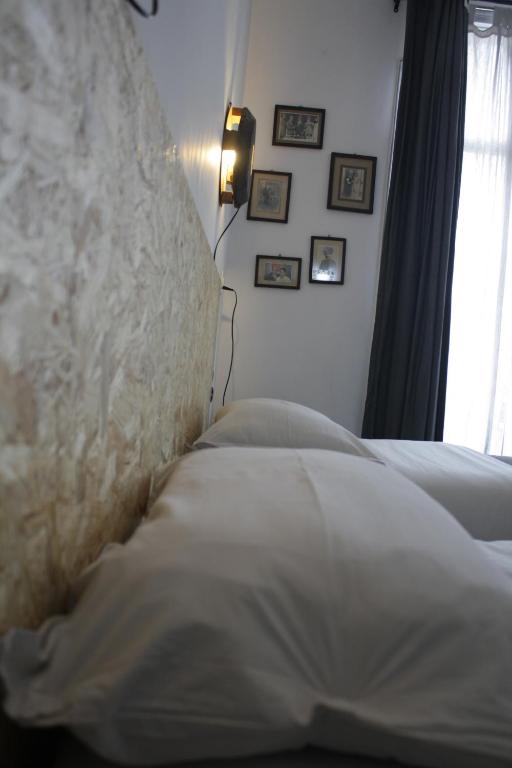 Postel nebo postele na pokoji v ubytování Bed & Chai Guesthouse