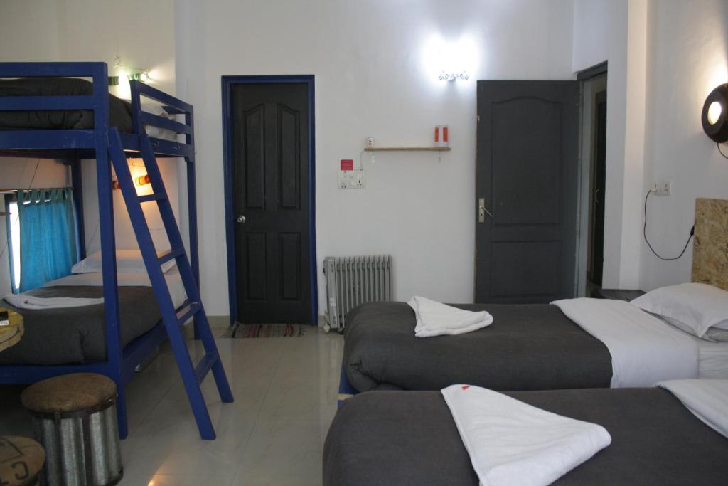 Postel nebo postele na pokoji v ubytování Bed & Chai Guesthouse