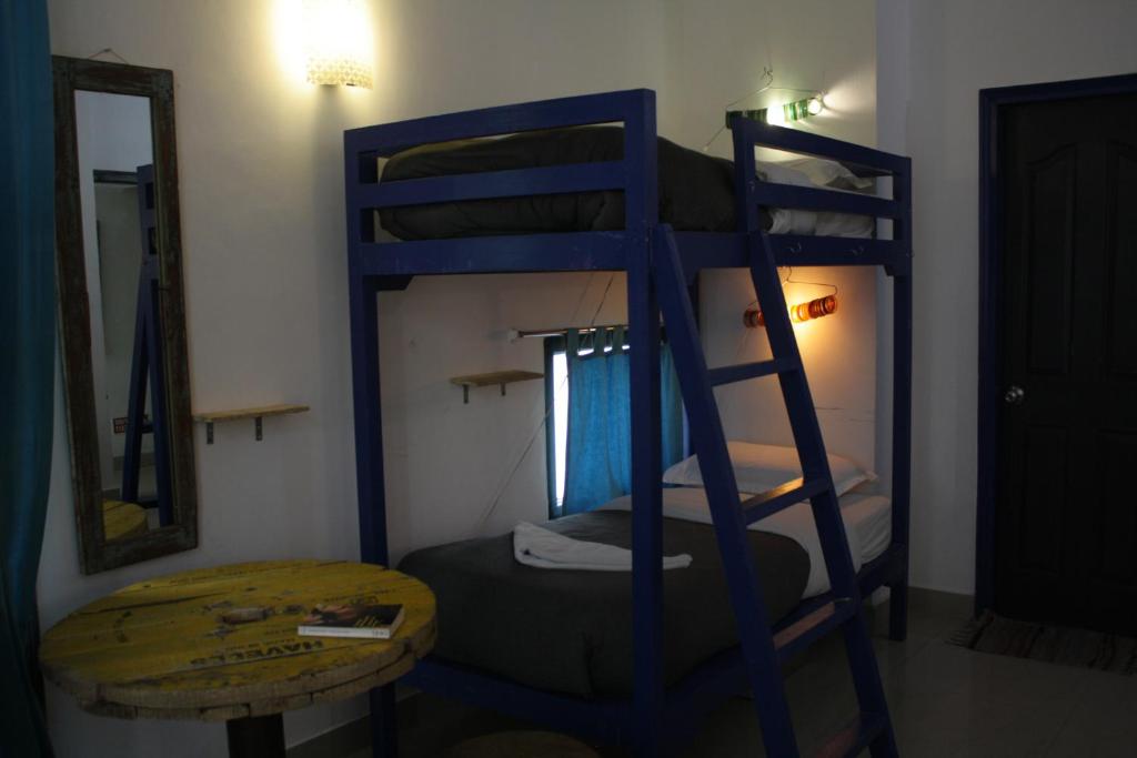 Palanda nebo palandy na pokoji v ubytování Bed & Chai Guesthouse