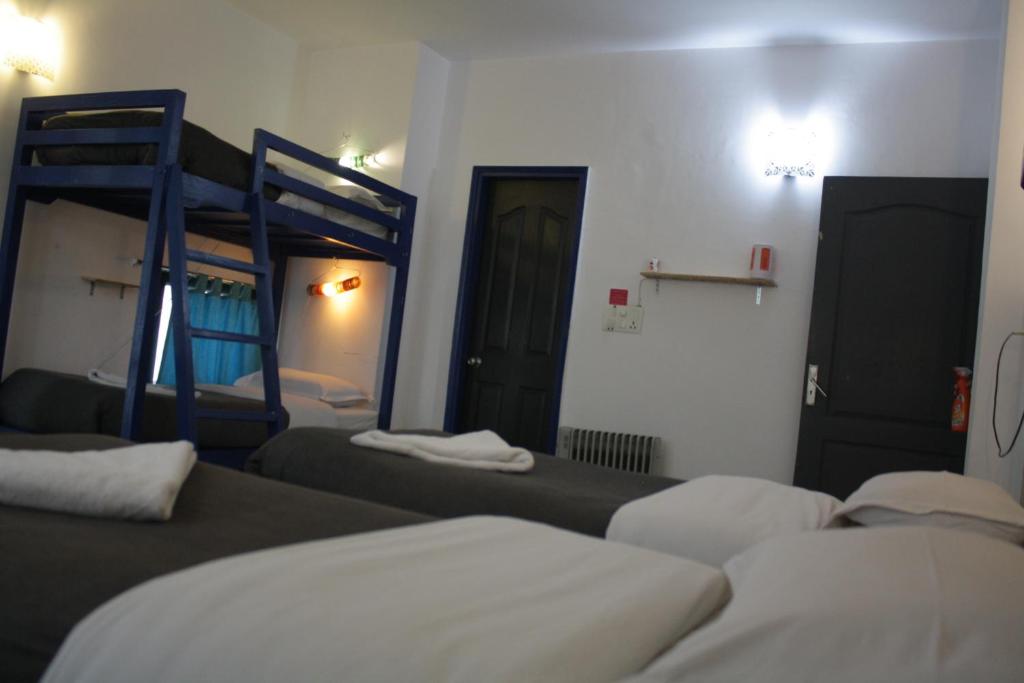 Postel nebo postele na pokoji v ubytování Bed & Chai Guesthouse