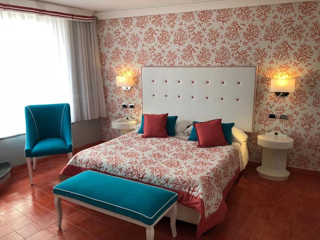 Postel nebo postele na pokoji v ubytování Hotel Prestige