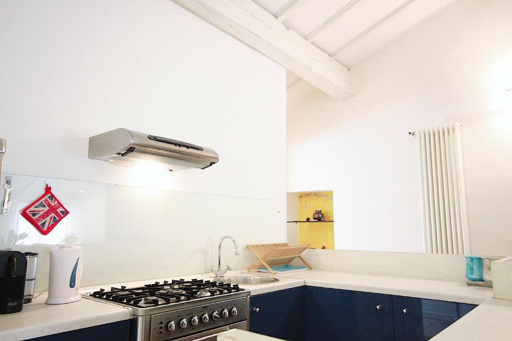 Kuchyňa alebo kuchynka v ubytovaní Bianco Apartment