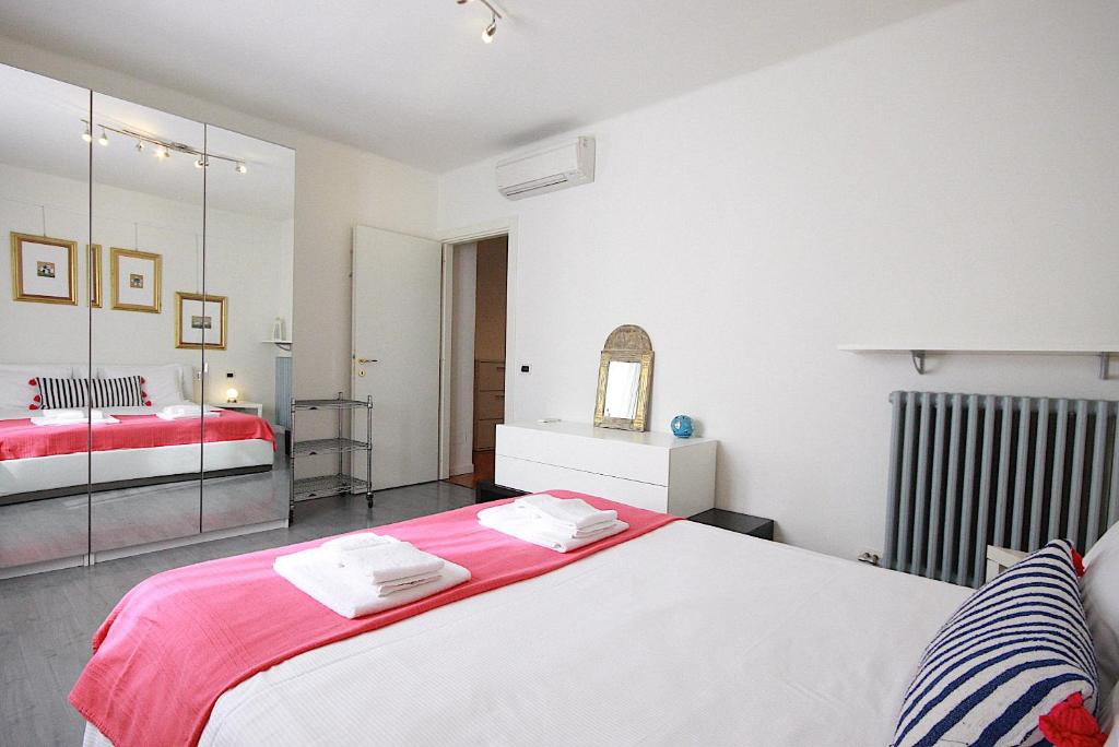 Posteľ alebo postele v izbe v ubytovaní Bianco Apartment