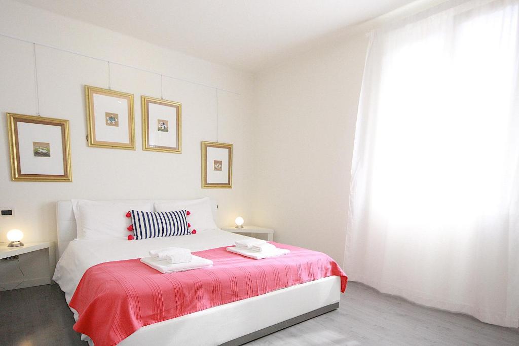 Posteľ alebo postele v izbe v ubytovaní Bianco Apartment