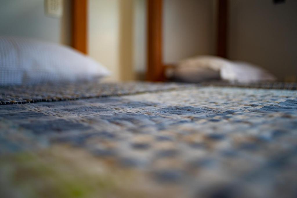 Postel nebo postele na pokoji v ubytování Lira Hostel