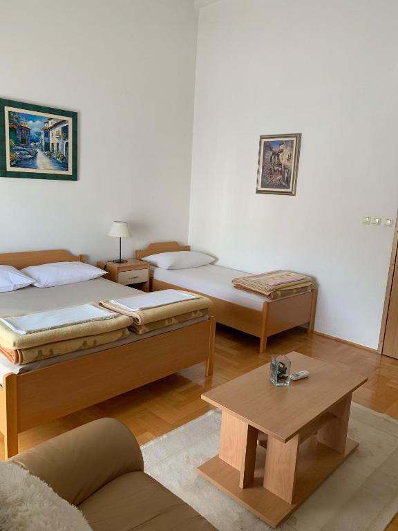 Postel nebo postele na pokoji v ubytování Pansion Villa Bubalo