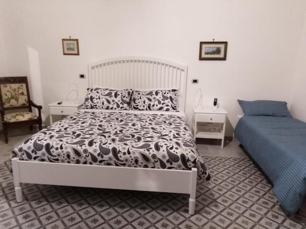Postel nebo postele na pokoji v ubytování B&B Stella