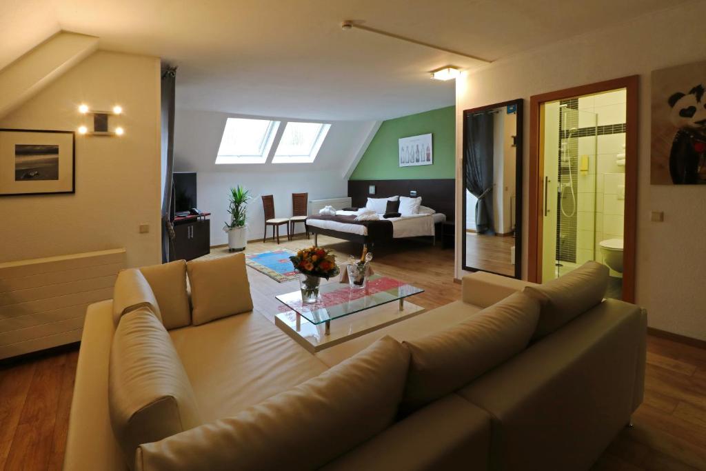Posezení v ubytování Threeland Hotel