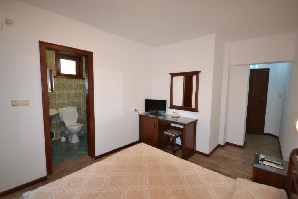 Postel nebo postele na pokoji v ubytování More Family Hotel