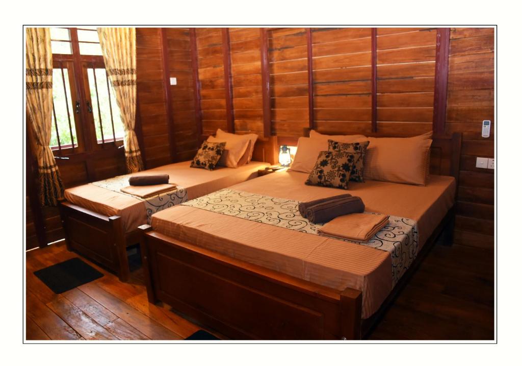 Postel nebo postele na pokoji v ubytování Sun and Green Eco Lodge - Dambulla